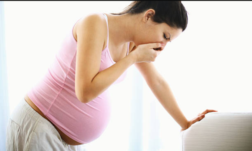 why woman vomit when pregnant